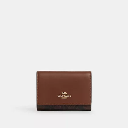 Coach Micro Wallet In Signature Canvas-Color:  Im/Brown/Redwood